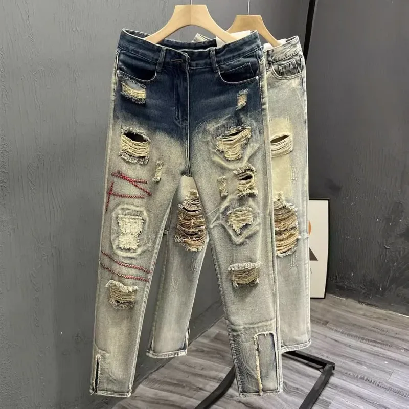 

Men's clothing spring and autumn high quality ripped jeans fashion stitching handsome slim straight trousers