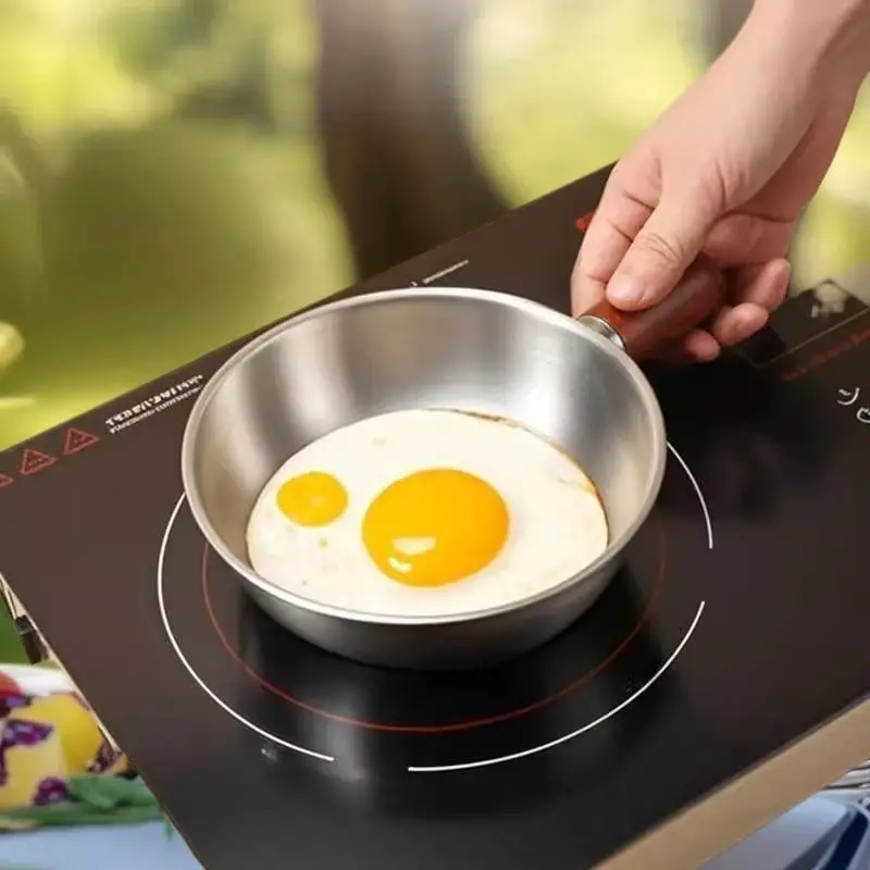 وعاء من الفولاذ المقاوم للصدأ لشخص واحد مع مقبض من خشب الجوز لسلطة الفاكهة، وأدوات المطبخ للمطعم