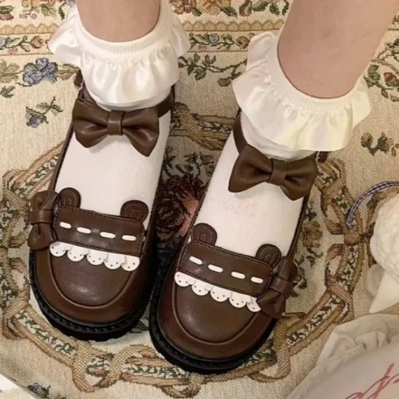أحذية نسائية مسطحة ربيعية جديدة برأس مستدير وفم ضحل وعقدة على شكل فراشة ونعل سميك أحذية مانعة للانزلاق