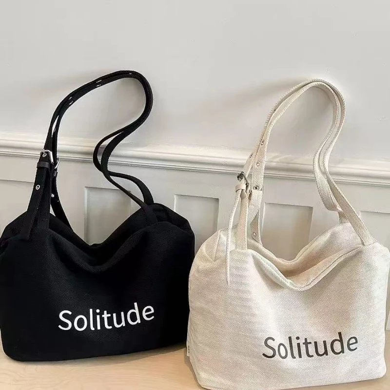 

2026 New Summer Women's Crossbody Bag Korean Style Large Capacity Canvas Tote Bag for Commute School with Letter Design