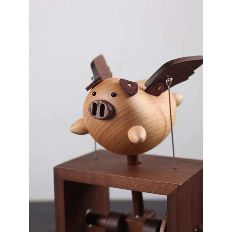 Wooden hand-cranked music box, high-end cartoon flying pig ornament, Valentine's Day birthday gift.