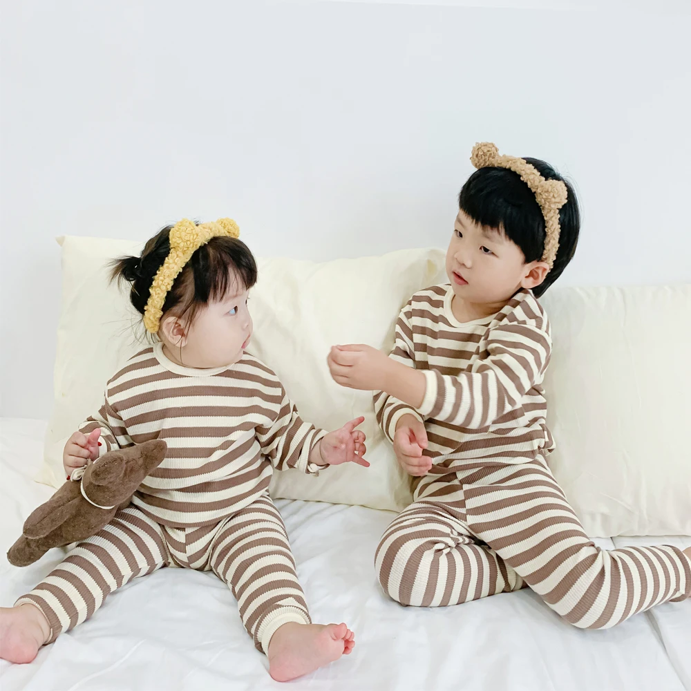 Autumn 2022 new baby comfortable and soft baby waffle suit Round Neck Long Sleeve Top + pants two piece set high quality