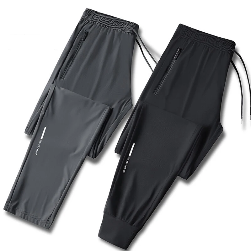 Wysokiej jakości spodnie z lodowego jedwabiu dla mężczyzn Summer Slim Casual New Loose High Elasticity Quick Drying Outdoor Running Casual Pants