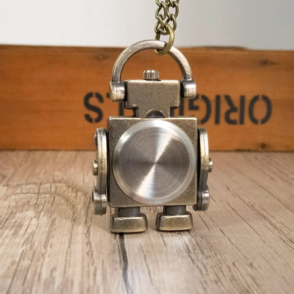 นาฬิกาพกควอตซ์หุ่นยนต์ที่ทันสมัยและเท่ห์พร้อมหน้าปัดทรงกลมตัวเลขอารบิกเป็นของที่ระลึกสำหรับนักเรียนชายและหญิง