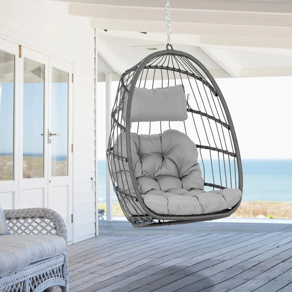 

folding wicker rattan swing egg chair for indoor and outdoor use with hanging chains and uv resistance