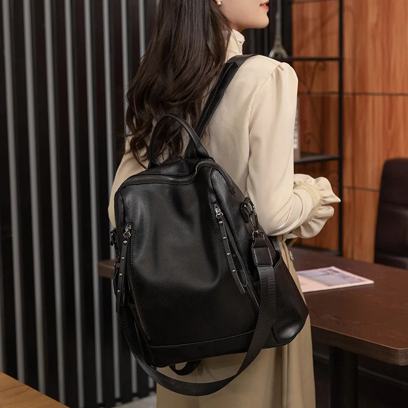 Mochila de viaje de piel sintética para mujer, bolso de hombro impermeable, antirrobo, escolar, a la moda, novedad de 2023