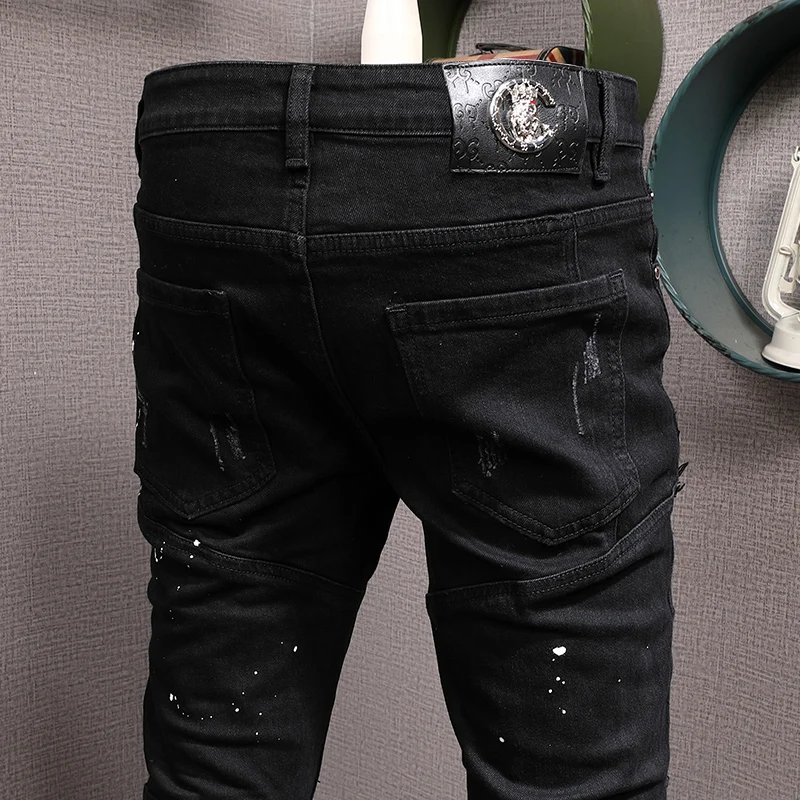 Streetwear moda masculina jeans preto cor estiramento elástico fino ajuste pintado rasgado jeans masculino remendo designer hip hop calças hombre