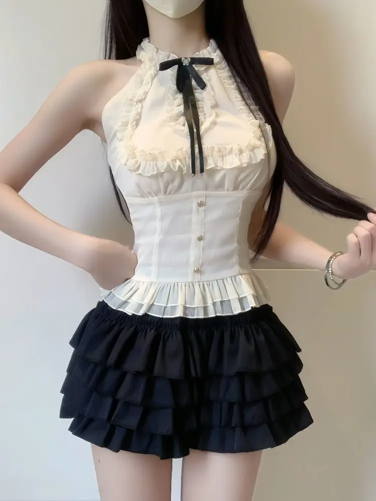 Seksowny, gorący zestaw dwuczęściowy z wycięciami i dekoltem typu slash, elegancki, słodki, nowy komplet damski, modny, ciepły, czarny, krótki spódniczka typu cake.