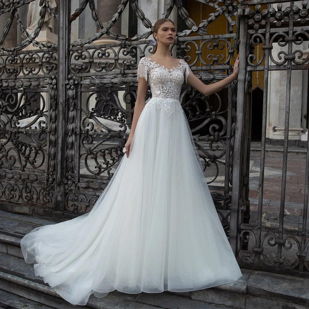 Flavinke-Robe de Mariée Trapèze en Tulle, Élégante, Manches Cape, Pompon, Col Rond Transparent, Dentelle Formelle, Patients, Bouton, Dos, Balayage, Traîne