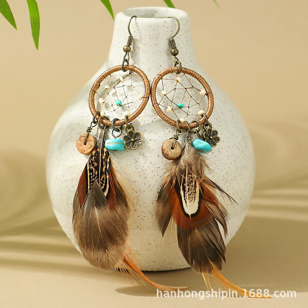 Europe and the United States hot-selling retro bohemian earrings handmade dream catcher feather earrings long fringed earrings w
