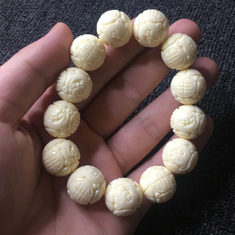 

Ivory Nut Carved Dragon Ball Embossed Bracelet1.8*13Bodhi Seeds Beads Bracelet for Men and Women Beads Car Ornaments