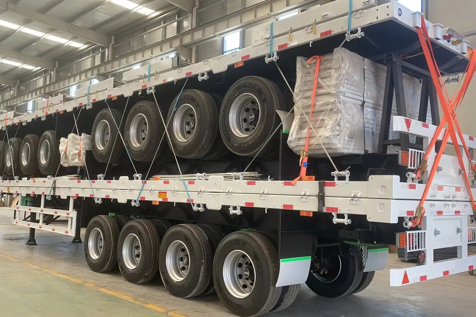 JKG Factory مخصص 40T أفضل بائع سرير مسطح شبه مقطورة 3 محاور للحاوية شبه مقطورة للحاوية #4