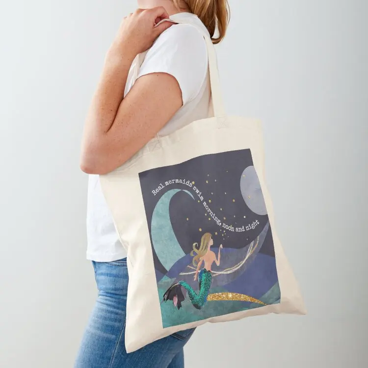 Calling all wild open water swimming, winter bathers. Born to swim mermaid design for swimmer lovers. Caroline Laursen  Tote Bag