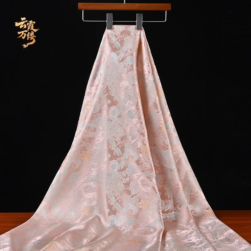 The new Chinese-style imitation brocade light and elegant pink embossed jacquard fabric can be cut into dress design