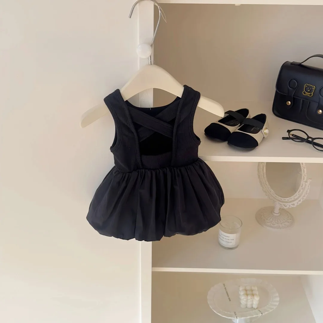 Summer new sweet and cool girl Korean sweet girl black flower bud skirt cross backless vest dress, trendy