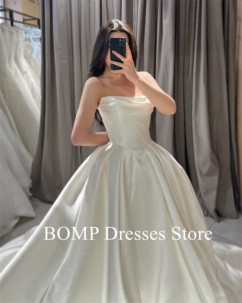 ชุดแต่งงานทรงเอไลน์แบบเรียบง่าย สายเดี่ยว ผ้าซาติน จับจีบ ยาวแบบชัพเพล  ชุดเจ้าสาวแบบปรับแต่งได้ สไตล์เจ้าหญิง