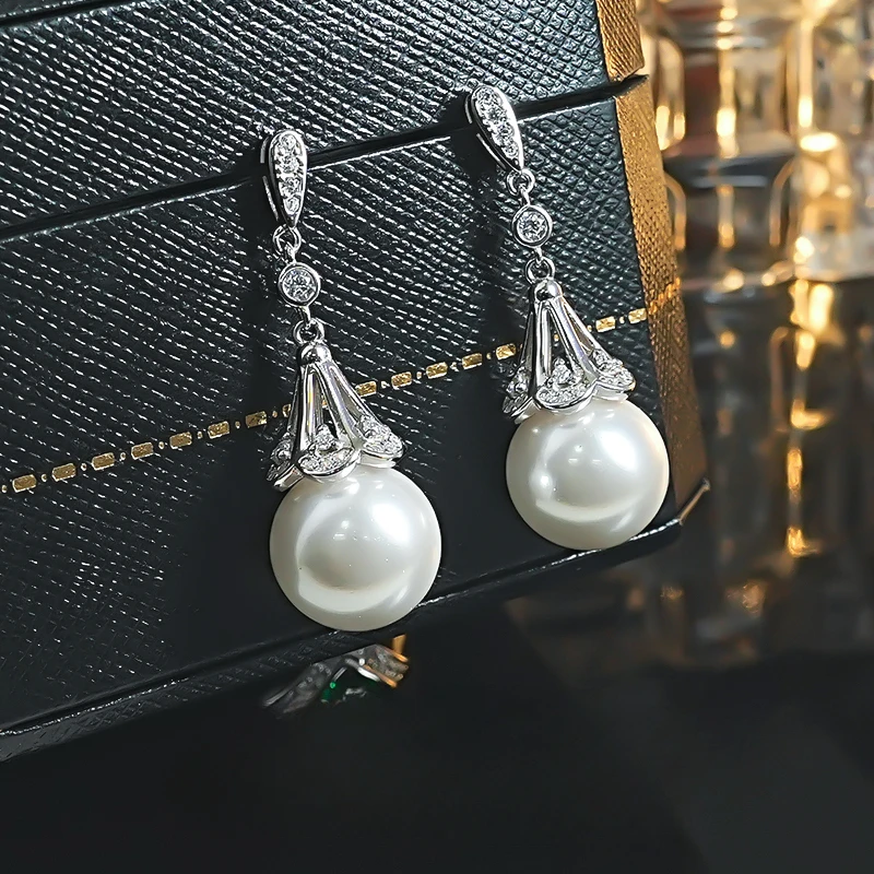 Australian white strong light round mother of pearl 925 pure silver earrings classical light luxury socialite hot selling