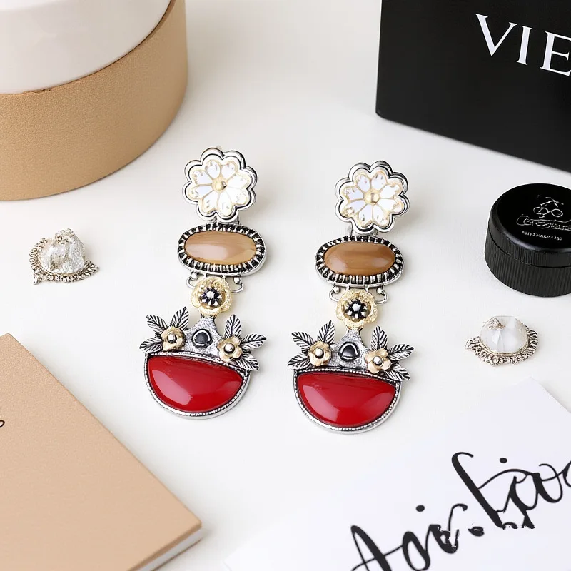 Vintage bohemian resort style gold and silver color-blocked floral earrings, travel jewelry