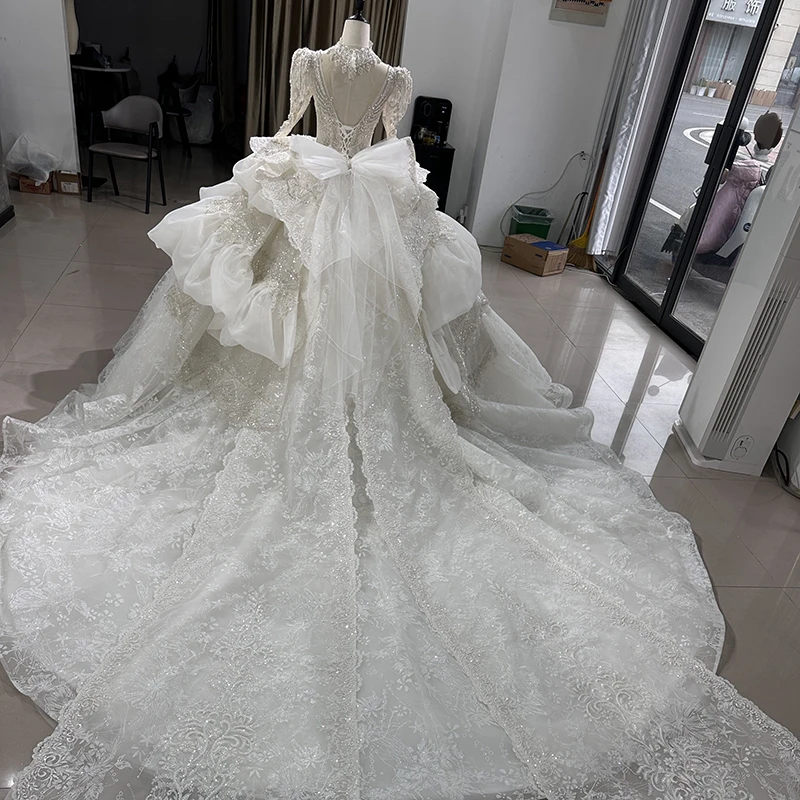 Abito da sposa Sexy di lusso avorio di fascia alta personalizzato Dubai maniche lunghe abito da sposa con perline di diamanti su misura XS005