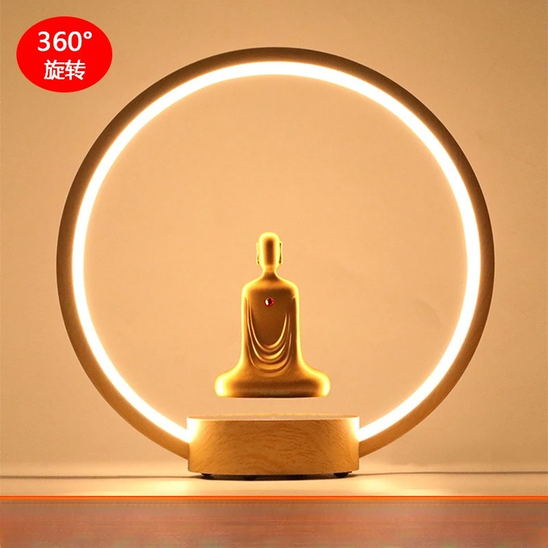 

Magnetic levitation gold-plated faceless Buddha statue rotation LED luminous ring table lamp Zen meditation Buddha statue