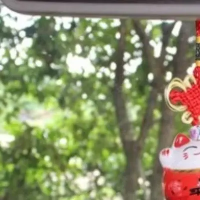 Lucky Cat Car Hanging Decoration with Knot Design for Mirror Use and Supportive Cultural Context in Daily Driving