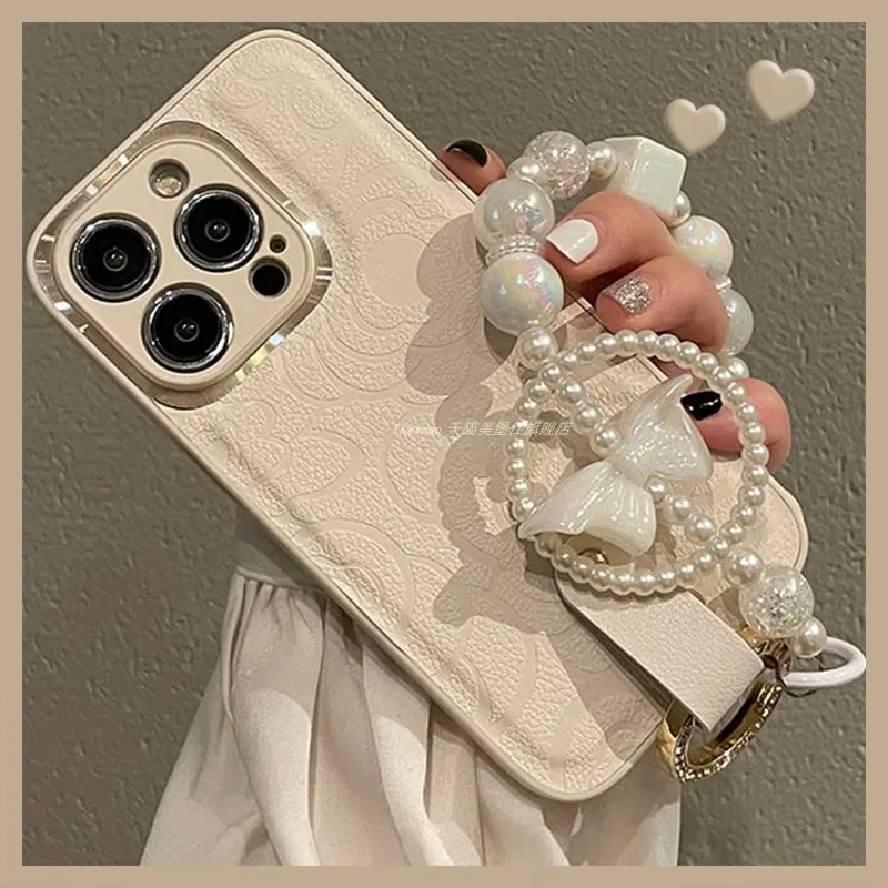 

New for iphone 15 Metal Ring Leather Camellia Case 14promax Gold Rhinestone Ring Bow Bracelet 13 12pro 11 Xsmax Protection Cover