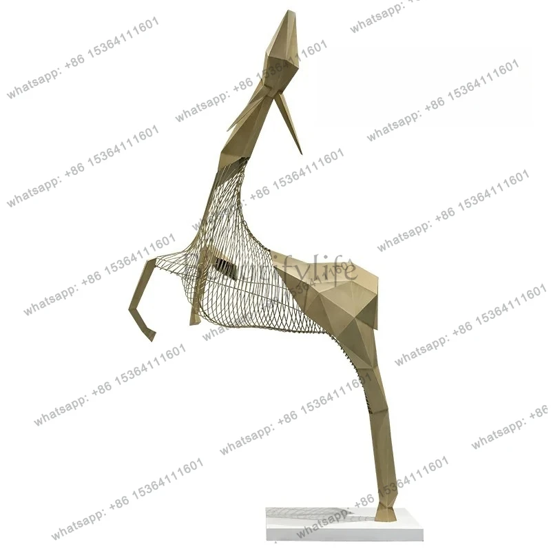 Stainless steel abstract deer sculpture, large floor-to-ceiling installation at the front desk of the sales hall