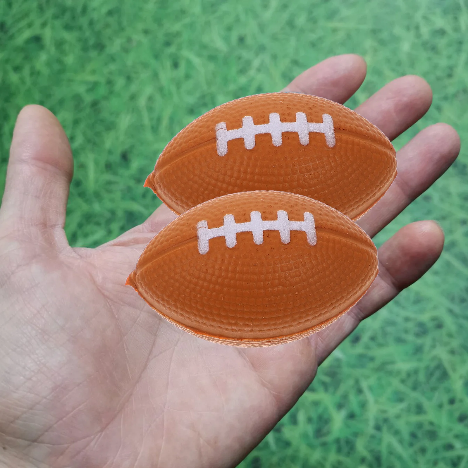 40 pezzi Pet Mini Rugby Toy Palline sportive per bambini Pompa ad aria Schiuma Calcio Spremere Ansia