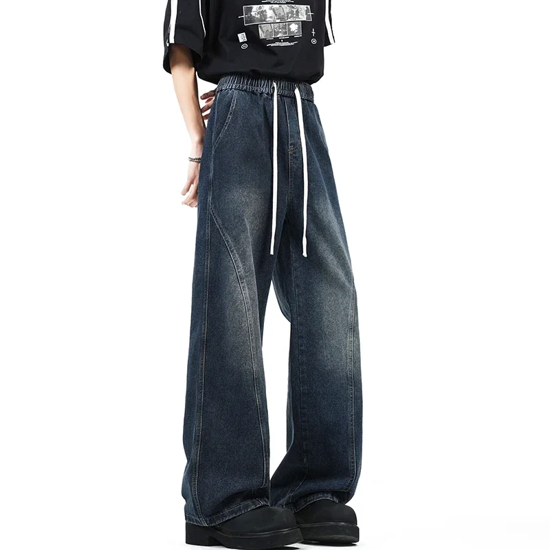 กางเกงยีนส์ขากว้างทรงหลวมสไตล์สตรีท ล้างสี รุ่นใหม่ ฤดูใบไม้ร่วง ปี 2025 สำหรับผู้ชายสูง 190 ซม. เอวยางยืด ความยาวพิเศษ 115 ซม. สวมใส่สบายๆ