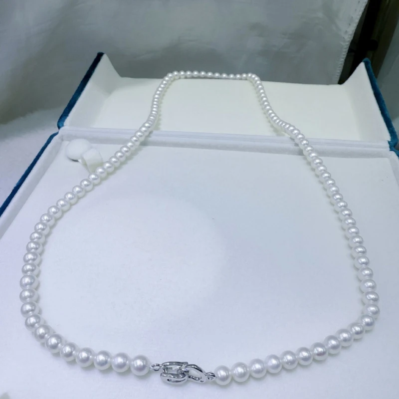 Freshwater pearl necklace 5-6mm, perfectly round, almost, with effect, gold-plated heart pendant, 60cm length
