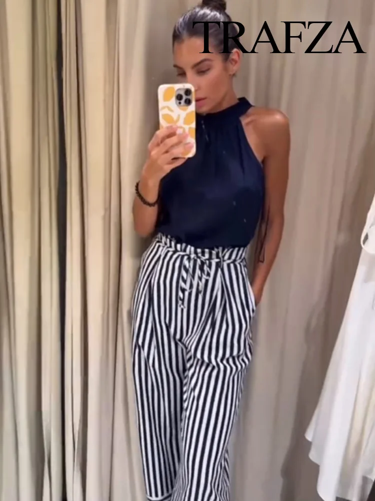 

TRAFZA Summer Women Fashion O-Neck Belt Decoration Striped Jumpsuit Female Pockets Zipper Sleeveless Back Hollow Jumpsuit