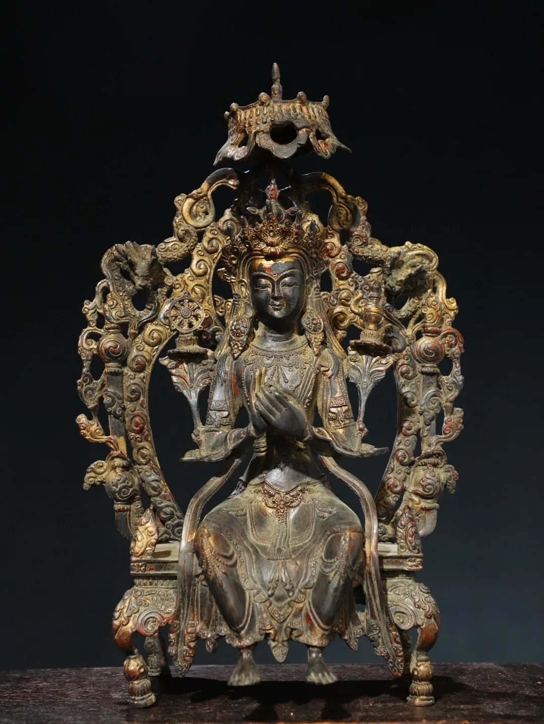 Nepalese Tibetan ornament made of brass, mud, gold, and colored painting, featuring a statue of the Avalokitesvara Bodhisattva i