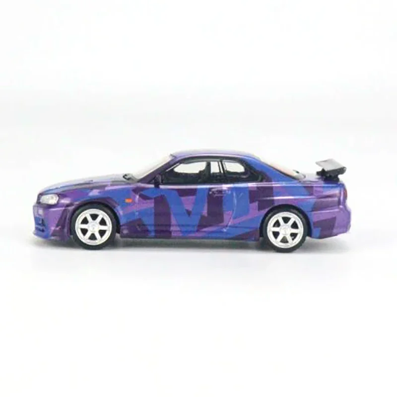 MINI GT 1:64 Nissan Skyline GT-R (R34) V-Spec II Digital Camouflage Purple  5 Years Anniversary Model RHD MGT00446-R racing car