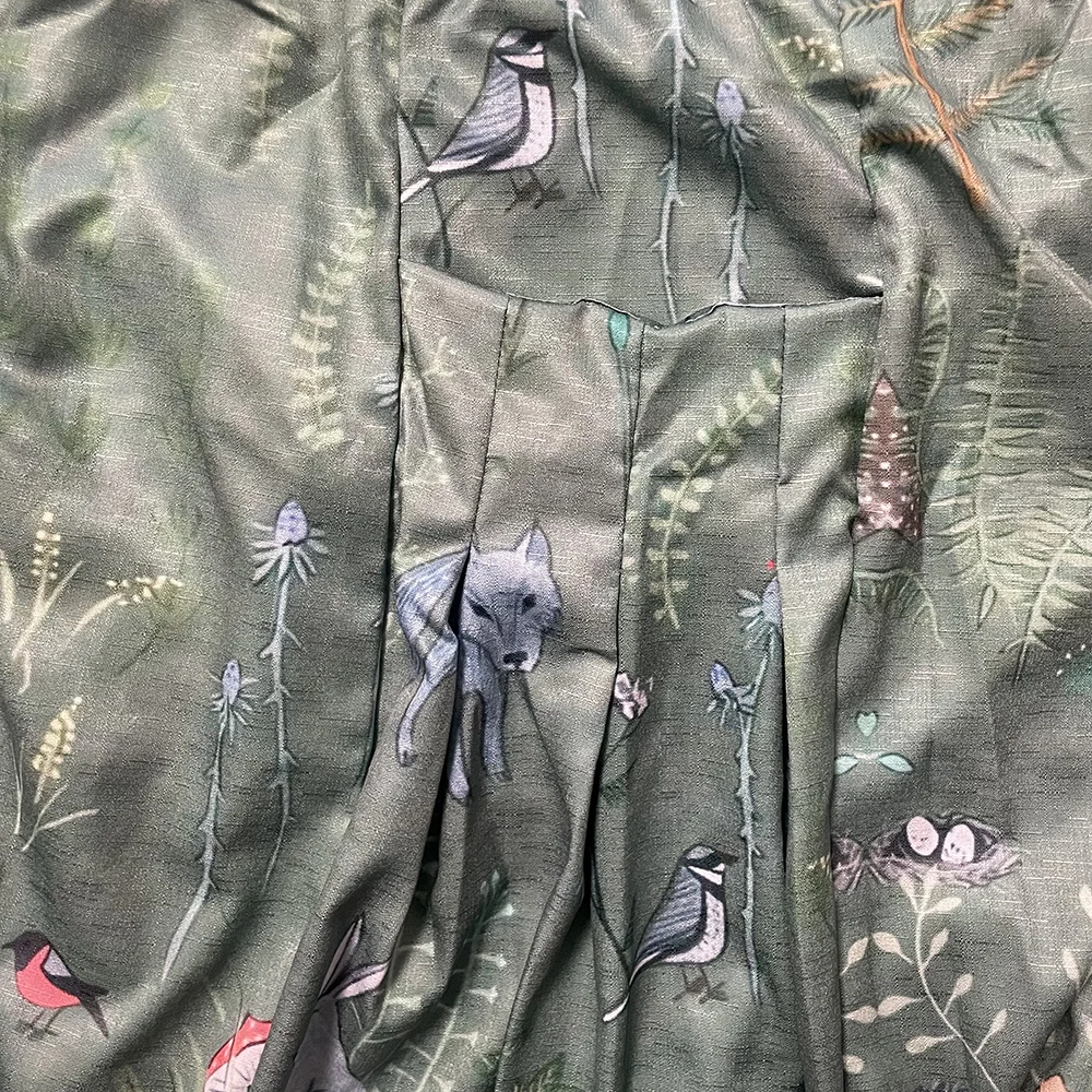 ボヘミアンシックな女性のユリ花柄マキシスカート ポケット付き ハイウエスト 伸縮性 快適 カジュアル ロングスカート 春夏用