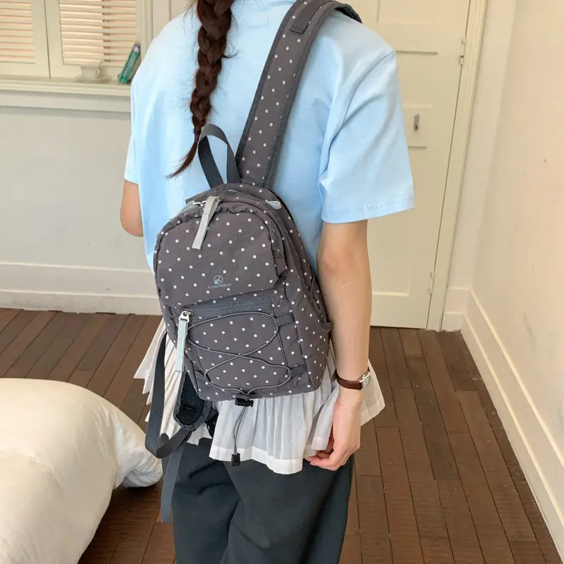 2026Summer Korean-style polka dot nylon backpack for women, lightweight, suitable for commuting, travel, and casual use, compact