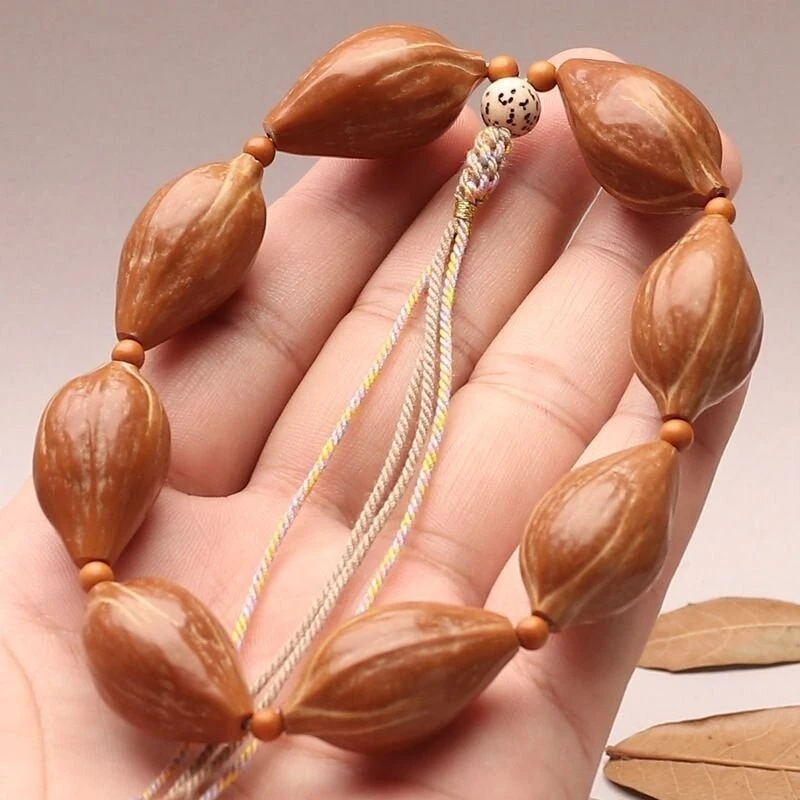 Núcleos de aceitunas pequeños de 1.6 mm, naturales, pelados a mano, con piel roja, sin aceite, de alta densidad, producto pulido.