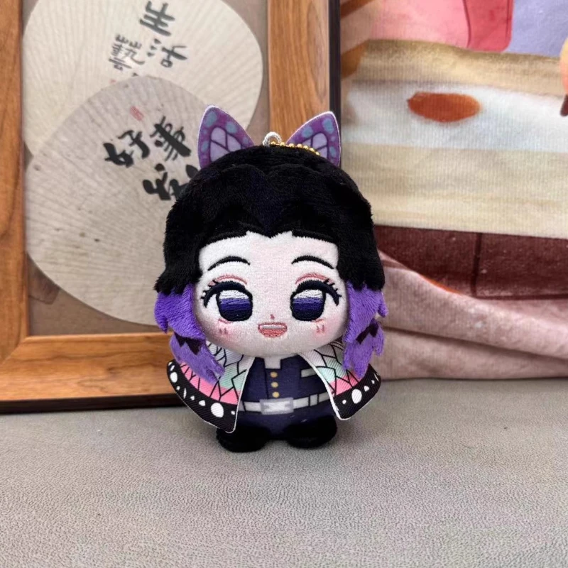 10 سنتيمتر أنيمي دور Kochou Shinobu Iguro Obanai Kawaii تأثيري دمية صغيرة قلادة بلوشيز لعبة أرقام المشجعين جمع الهدايا بلوشي