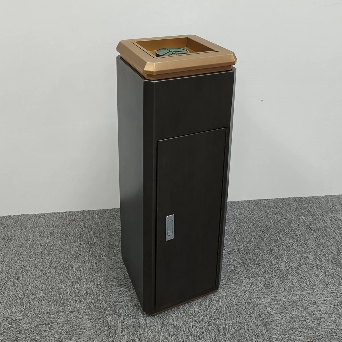 Stainless steel fruit peel garbage bin with vertical ashtray in sales office, elevator entrance in shopping mall lobby