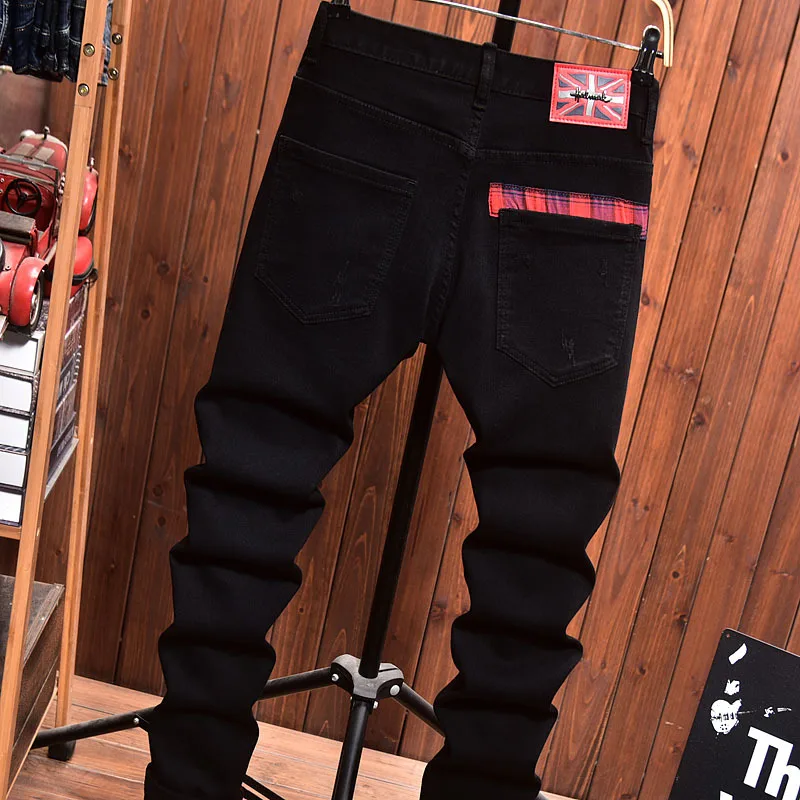 Jeans Ripped Pria dengan Desain Tambal Sulam Slim Fit Skinny Spring Trendy Street Motorcycle Style Celana Panjang Hitam