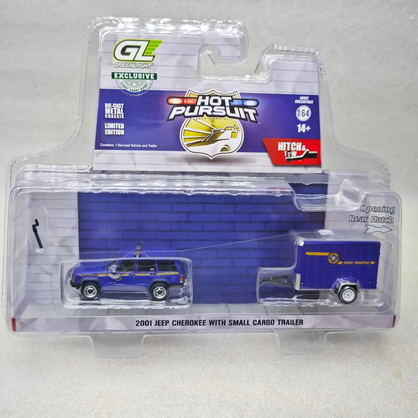 

GreenLight 1:64 H&T Series - 2001 Cherokee with Small Cargo Trailer - New York State Police