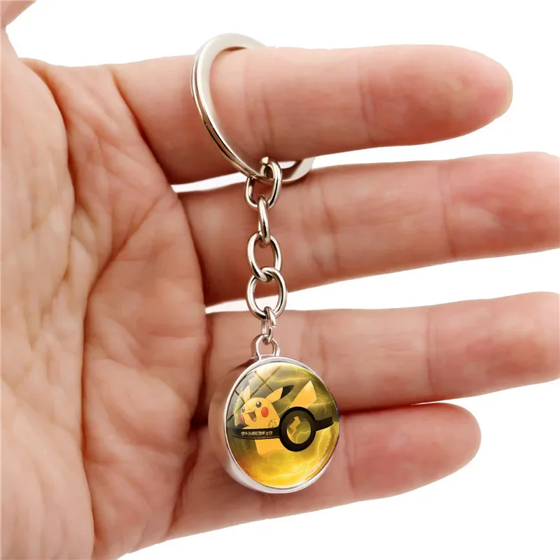 Anime Pokemon Figure Keychain Eevee Pikachu Mewtwo Pendant with Crystal Ball Glow in The Dark Key Chains Kids Birthday Gift