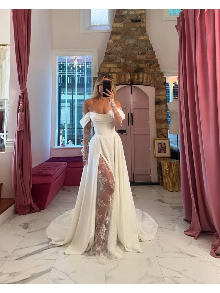 robe-de-mariee-vintage-en-dentelle-manches-longues-epaules-denudees-ligne-a-dos-nu-avec-des-appliques-de-princesse-personnalisee