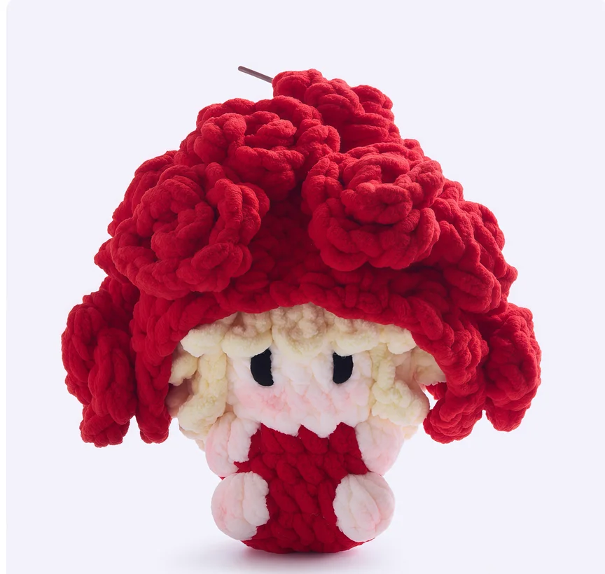Handmade crocheted plush doll keychains and bag charms for celebrity merchandise and concert support.