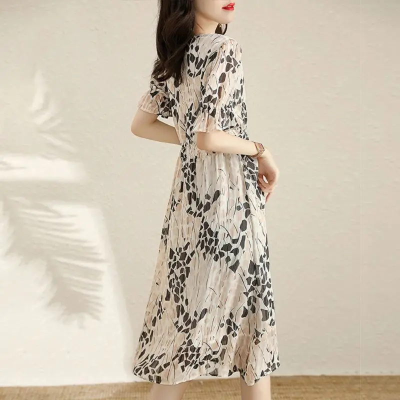 Elegant V-Neck Printed Folds Ruffles Flare Sleeve Party Dress Women\'s Clothing 2024 Summer New Loose Office Lady Floral Dress