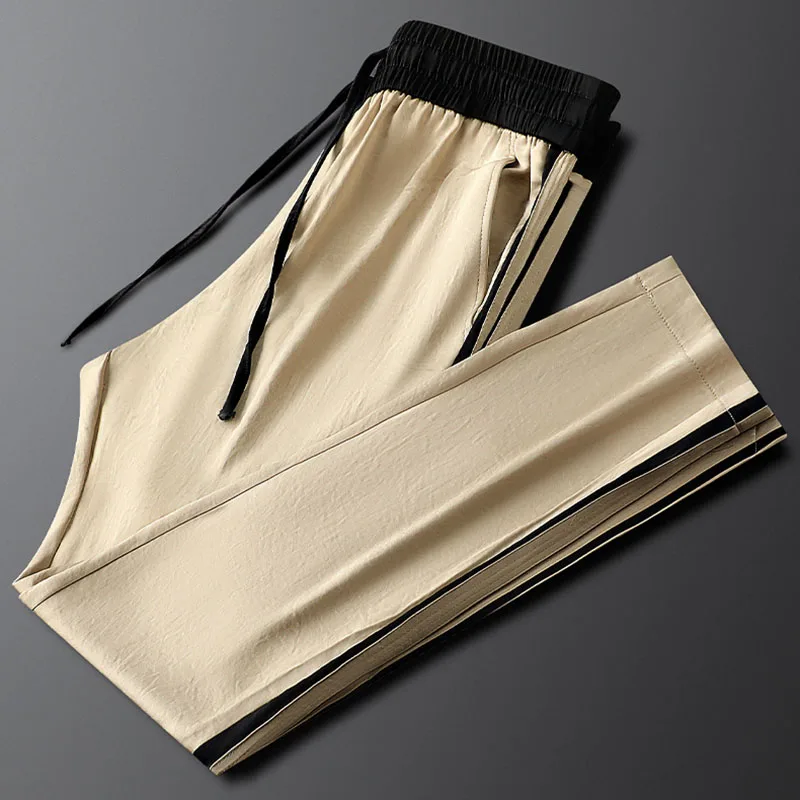 

Spring and summer new side striped casual sports pants men slim feet men's woven sweatpants