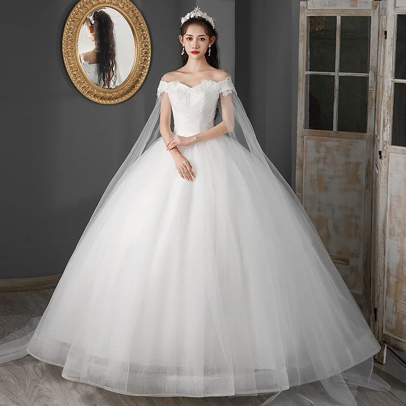 

Boat Neck With Long Cape Shawl Wedding Dress For Women Ball Gowns Brides Chal De Tul Brautkleid Für Damen Plus Größe Wholesale