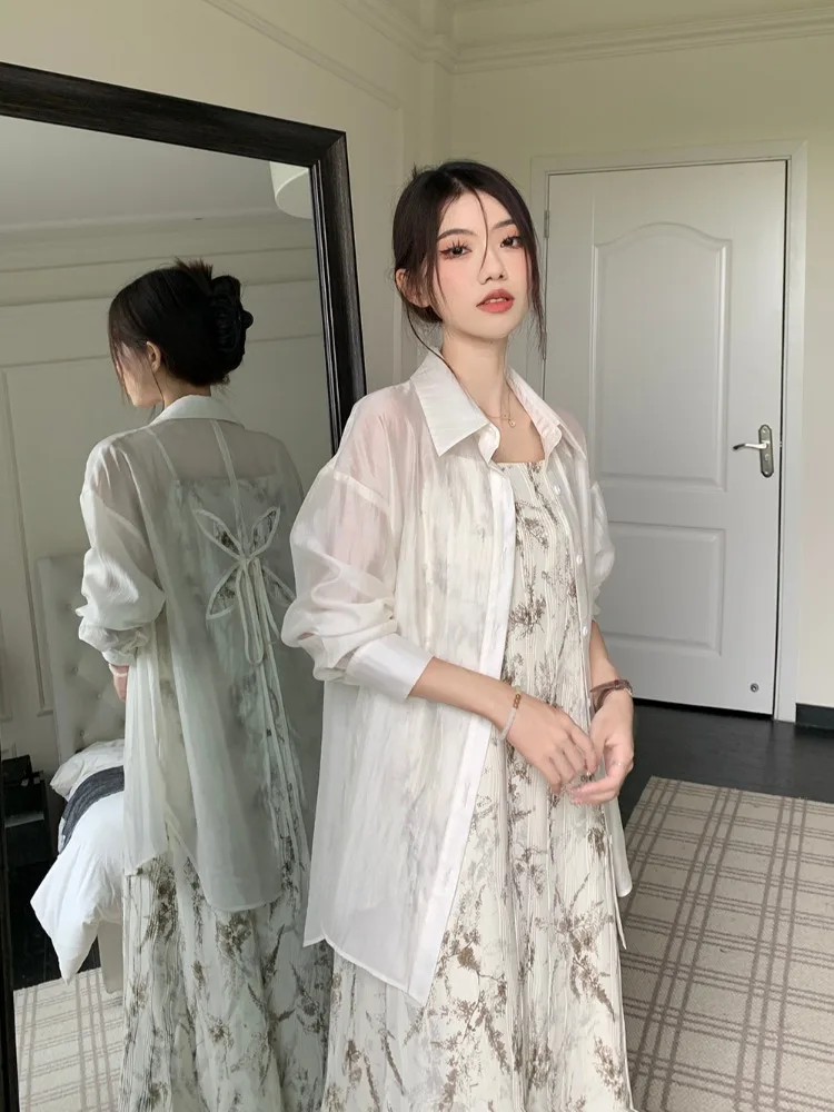 Femmes été 2025 nouveau noeud Sle évider Protection solaire irt léger en mousseline de soie vêtements d'extérieur Cardigan blanc