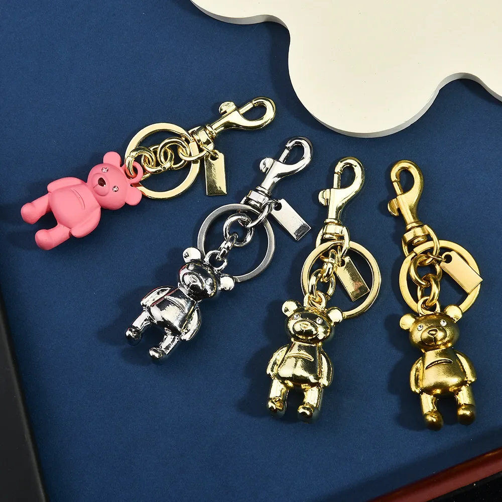

2025Car Key Pendant Accessories Golden Bear Cherry Clover Butterfly School Bag Accessories