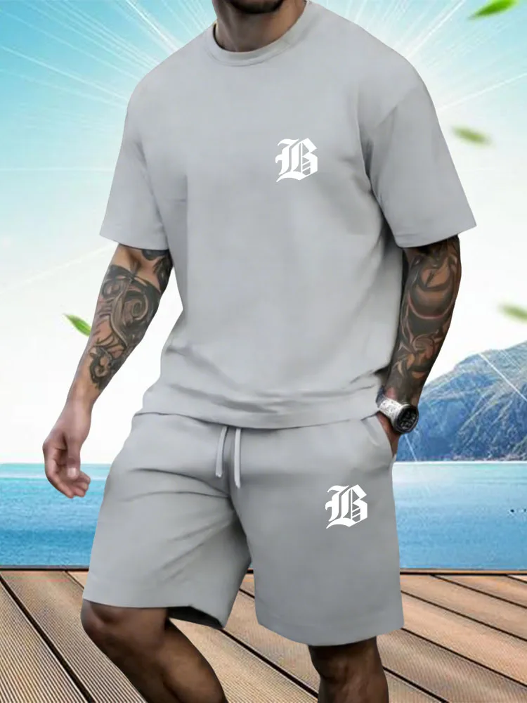 

Hot Selling Summer New Men's Set with Letter Print Casual Fashion T-shirt Short Sleeved Shorts Sports Outdoor Set