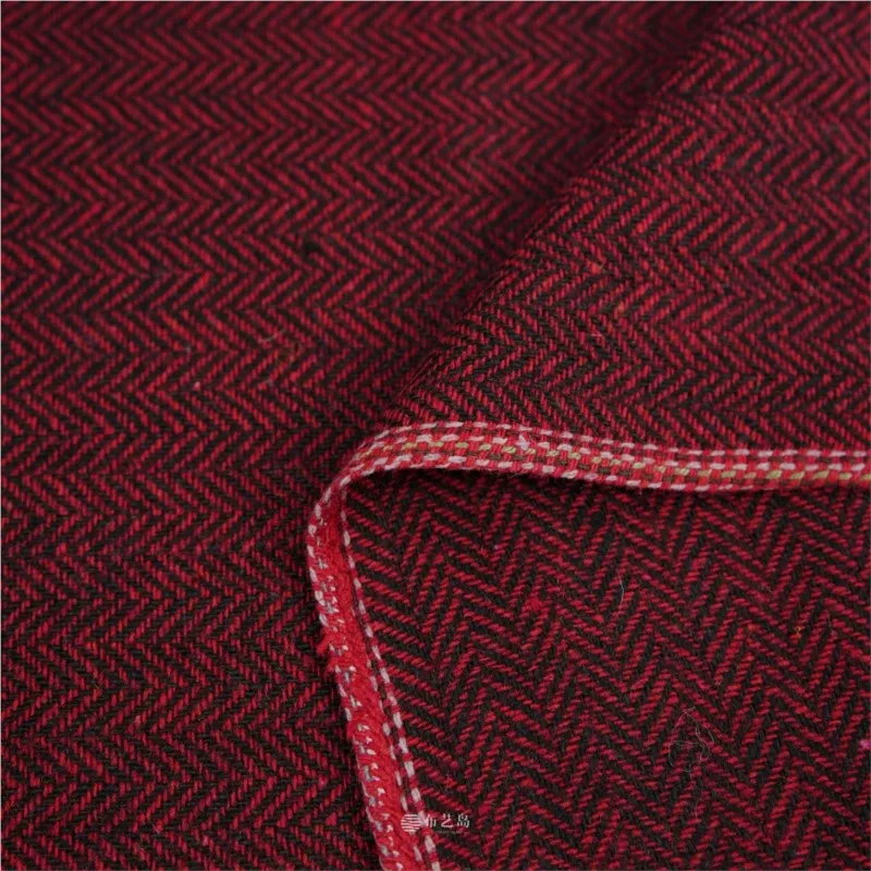 Red and black contrasting letter-patterned fine-spun woolen fabric is used as the for handcrafted outerwear suits